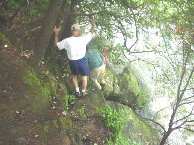 Very carefully scrambling down the bank to see Ellicott Rock.