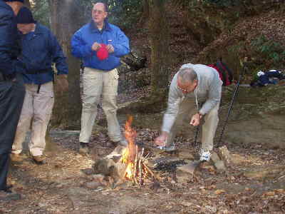 A small lunchtime campfire helps us warm up after our cold morning hike.