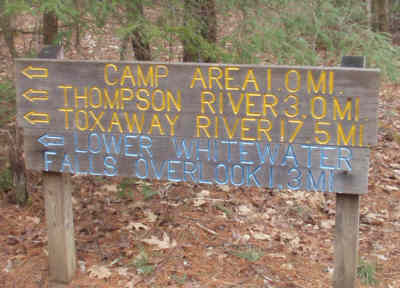 The trail sign just beyond the river.