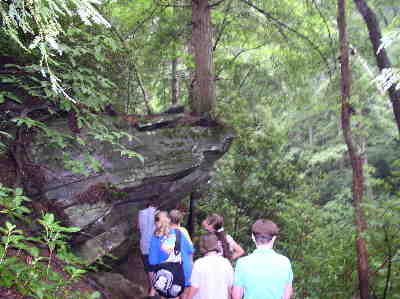 Here, we meet a group of 4-H'ers from Hart County, GA. The trail passes under a large rock out-cropping.