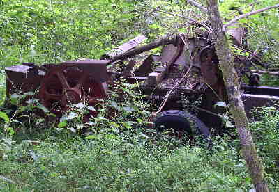 Here, we pass by an old abandoned hay baler. This area was farm land back in the 1930's.