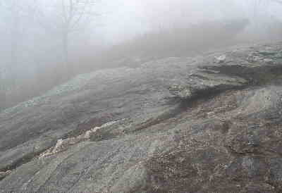 Cow Rock Mountain features massive rock cliffs.