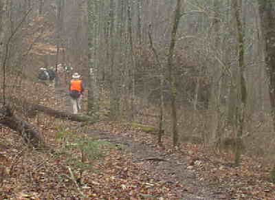 The misty rain made the trail foggy and damp.