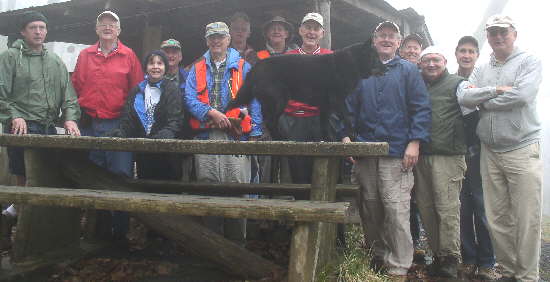 Lunchtime at the Siler Bald Shelter. The OFHC gang for today's hike. (l-r) Steve Bennett, Bob Presley, Donna Presley, John Hires, Dick Metzgar, Jack Slaton, Wayne Miller, Bob Thompson, Penny (the trail dog), Tony Presley, Phil Brownrigg, Doug Russell, Dan Ross, Jack Jacobi.