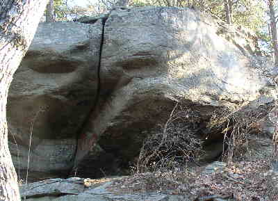 Along the trail, you will pass by many very large boulders and rock cliffs .
