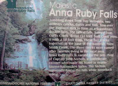An informative sign at the base of the falls.