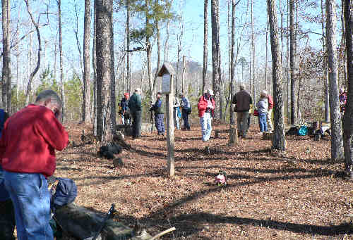 We walk down the Forest Service road and, take a break at the historic Ferabrew Cemetery.