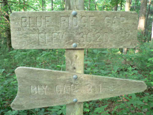 Trail signs near the parking spot.
