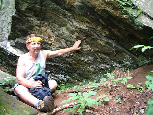 Bruce O'Connor points out the biotite gneiss locally injected with whitish veins of granite...What is he.... a geologist or something? ..........yes.