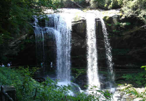 Next, we enjoy the cooling mist as we walk behind spectacular Dry Falls!