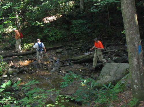 Crossing a cool mountain creek.