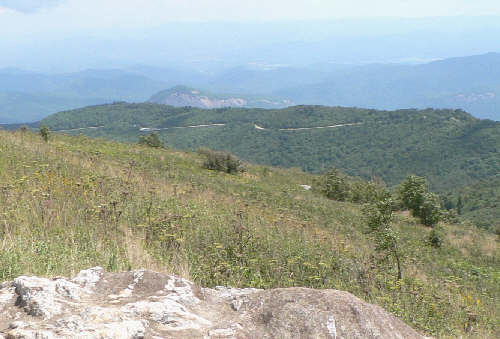 From Black Balsam (high spot of the hike at 6,214 ft), we look over to the Blue Ridge Parkway and Looking Glass Rock.