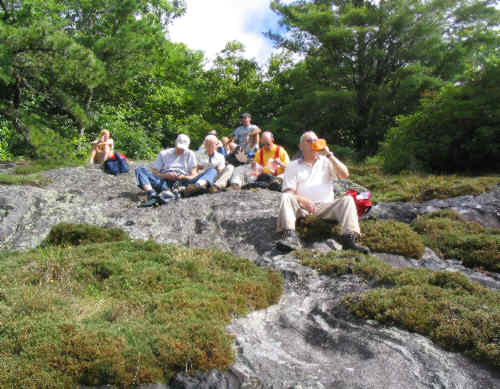 Lunch "on the rocks!" folded layers of biotite gneiss and schist.