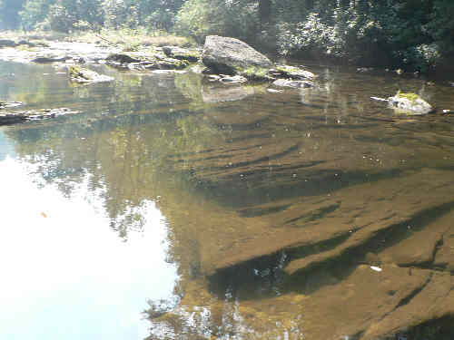 We now join the main river which at this point is very calm and crystal clear.