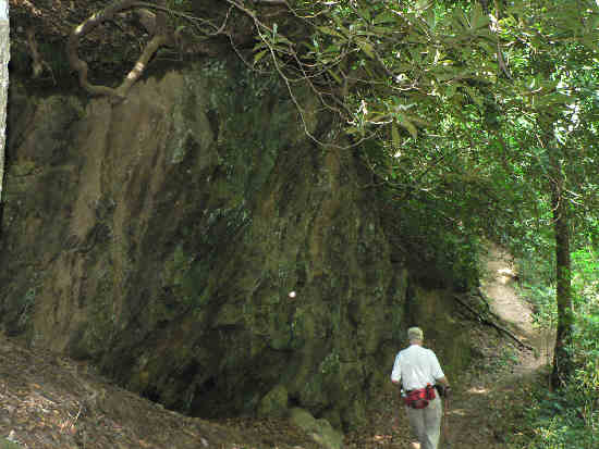 The trail passes by several huge rock walls.