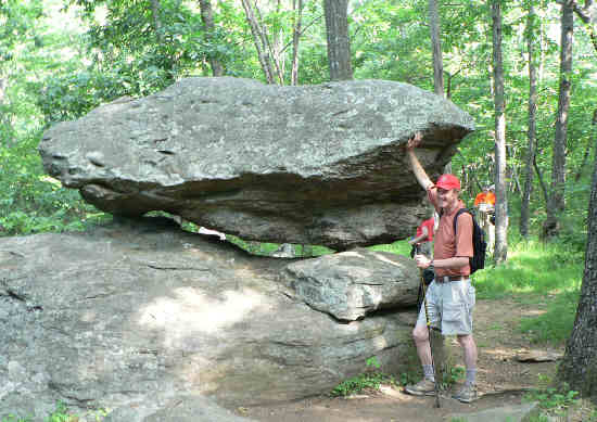 Near Flat Rock Gap, we view the amazing balanced rock. Pom keeps it from falling!