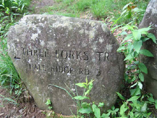 Trail junction marker. .