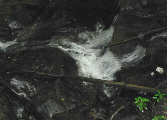 More water cascading over the rocks.