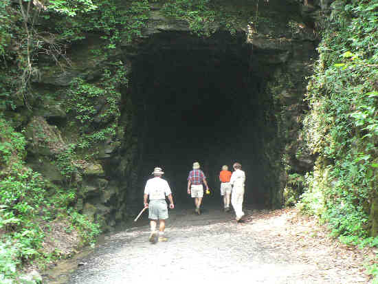 Entering Stumphouse Tunnel. This Historic Tunnel was part of a planned railroad in the 1850's. The tunnel was to carve through the solid granite of Stumphouse Mountain and was abandoned after 1600 feet as the project ran out of money and shortly after that, the Civil War began.