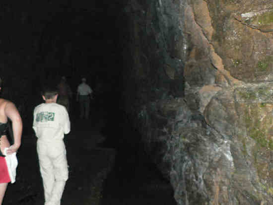 It gets dark very quickly as you enter the tunnel. Don't forget your flashlight!