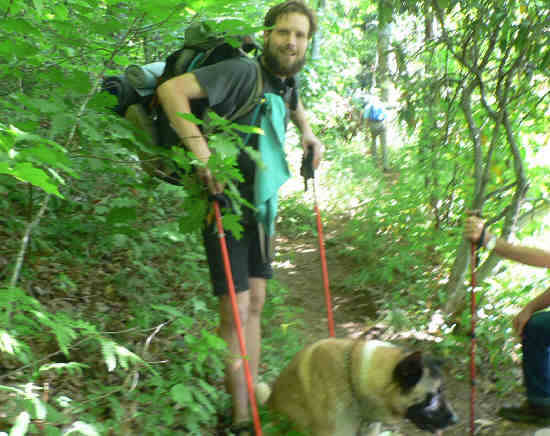 Here, we meet a thru-hiker from Pennsylvania. His trail name is "Groundhog" and his dog is "Paige". .