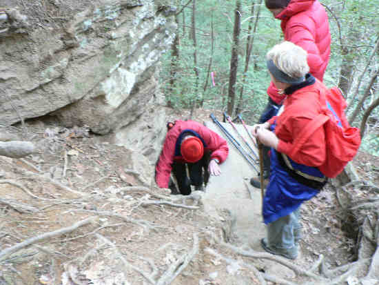 Carefully working our way through the rock crevice.