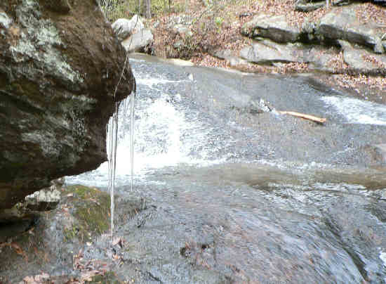 Icicles on the edge of the creek.