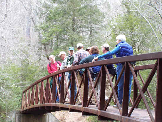 Deluxe metal foot-bridge across Warwoman Creek.