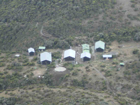 Looking down on some buildings from the trail above.