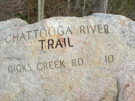 Large stone trail marker. .