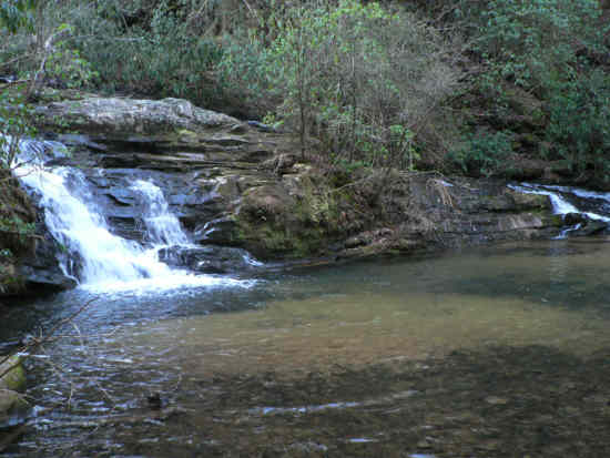 A little more than a half mile into the hike we view Pigpen Falls.