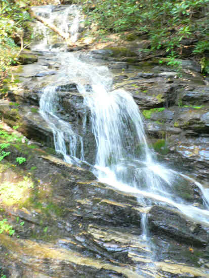 Becky Branch Falls is less than a half-mile into the hike .