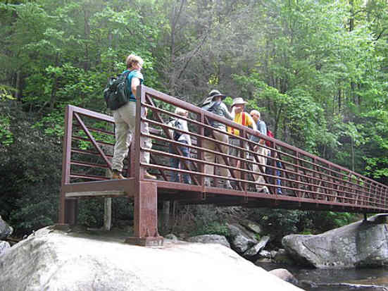 Crossing the foot-bridge over the Whitewater River.