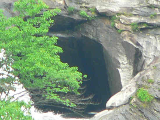 Extreme zoom photo of the cave near the top of the falls.
