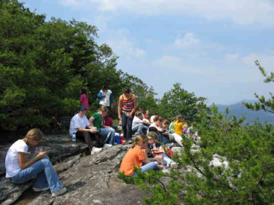 Arriving at Pinnacle Knob, we find about 30 girl hikers from Camp Pinnacle. .