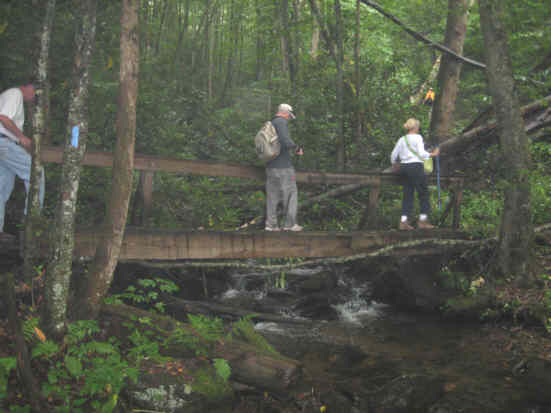 Crossing a foot-bridge on the Park Creek Trail.