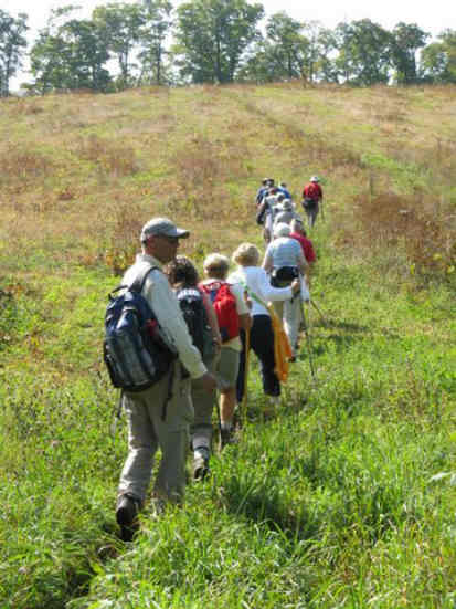 Heading up the long grassy slope to the summit of Siler Bald.