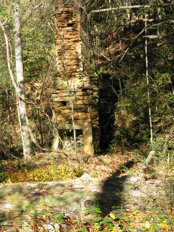 Just beyond the hay baler we pass the remnants of the old farm house. 1940's version of a stacked stone fireplace.