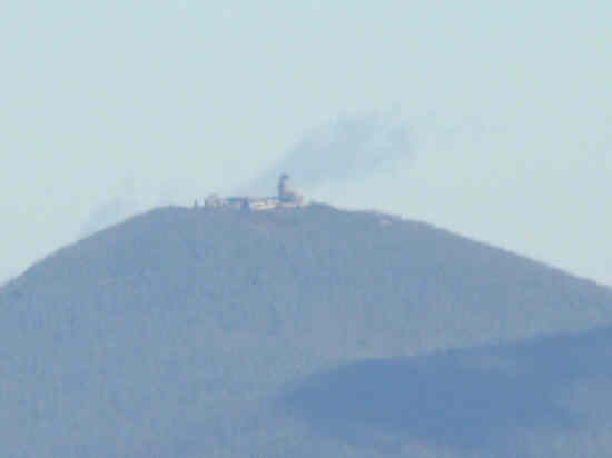 On the way down Wolf Laurel, we spot Brasstown Bald in the distance. This is an extreme zoom photo of the visitors center at Brasstown.
