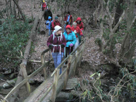 Crossing the footbridge across King Creek.