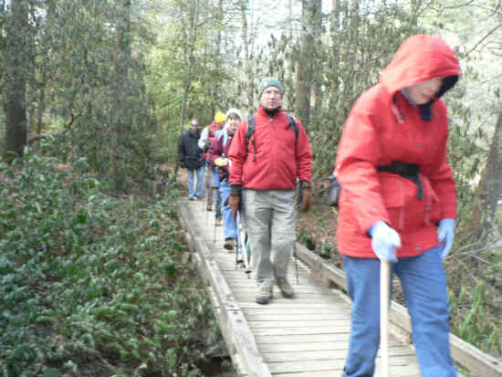 Crossing a foot-bridge on the Chattooga River Trail near Burrells Ford.