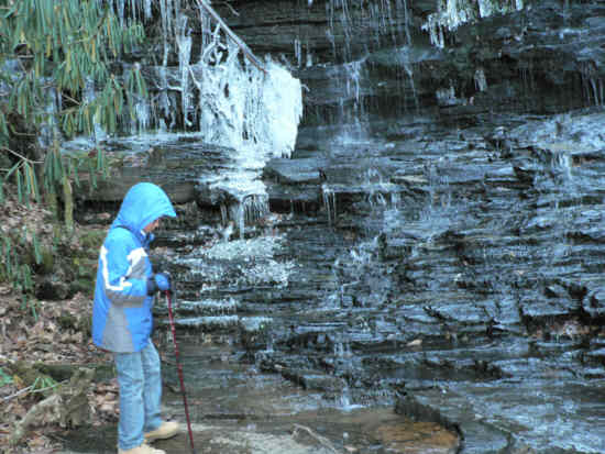 Mitch explores the icy rocks at Spoon Auger!