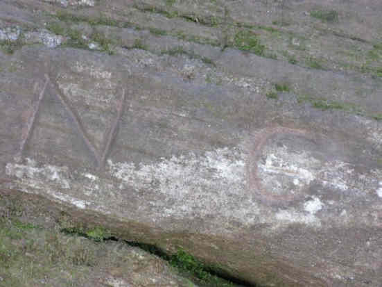 About 15 feet north of the first rock is Ellicott Rock simply engraved N.C.