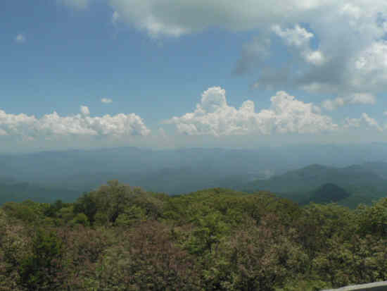 Blue sky, clouds and mountains.