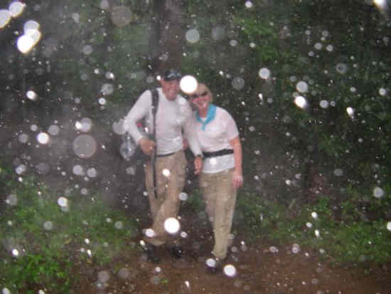 As we are near the end of a beautiful hike, we were surprised by a sudden hailstorm with pea-sized hail. The flash made larger reflections but photo is during the hailstorm. Joe and Carole sticking together through hail and high water!