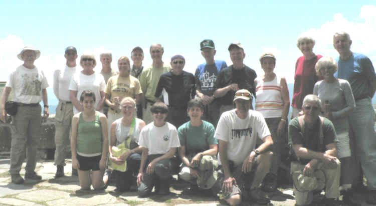 The OFHC gang for today's hike at Wayah Bald. (l-r kneeling) Rachael Saporito, Lynne Saporito, Donna Presley, Karen Brown, Pom Sinnock and Vic Robson. (standing l-r) Tony Presley, Joe Raguckas, Carole Raguckas, Jim Driggers, Gretta Driggers, Dave Hinson, Dan Ross, Doug Russell, Phil Brownrigg, Dave Standard, Jeanne O'Connor, June Bellamy, Pam Euliss and John Bellamy.