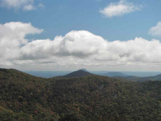 Nice blue sky, puffy clouds and mountains!