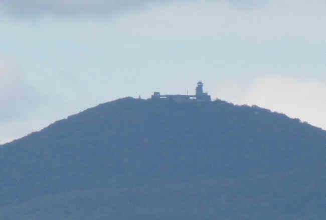 80X zoom photo of Brasstown Bald in the far distance.