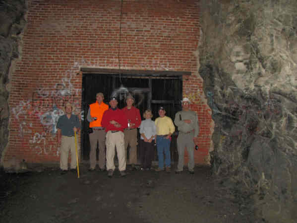 The brick wall and gate are additions by Clemson University in the 1950s for creating an area to conduct experiments with aging cheese.