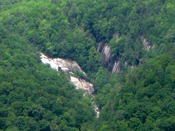 Looking back up toward Lower Whitewater falls from the park south of the trailhead.
